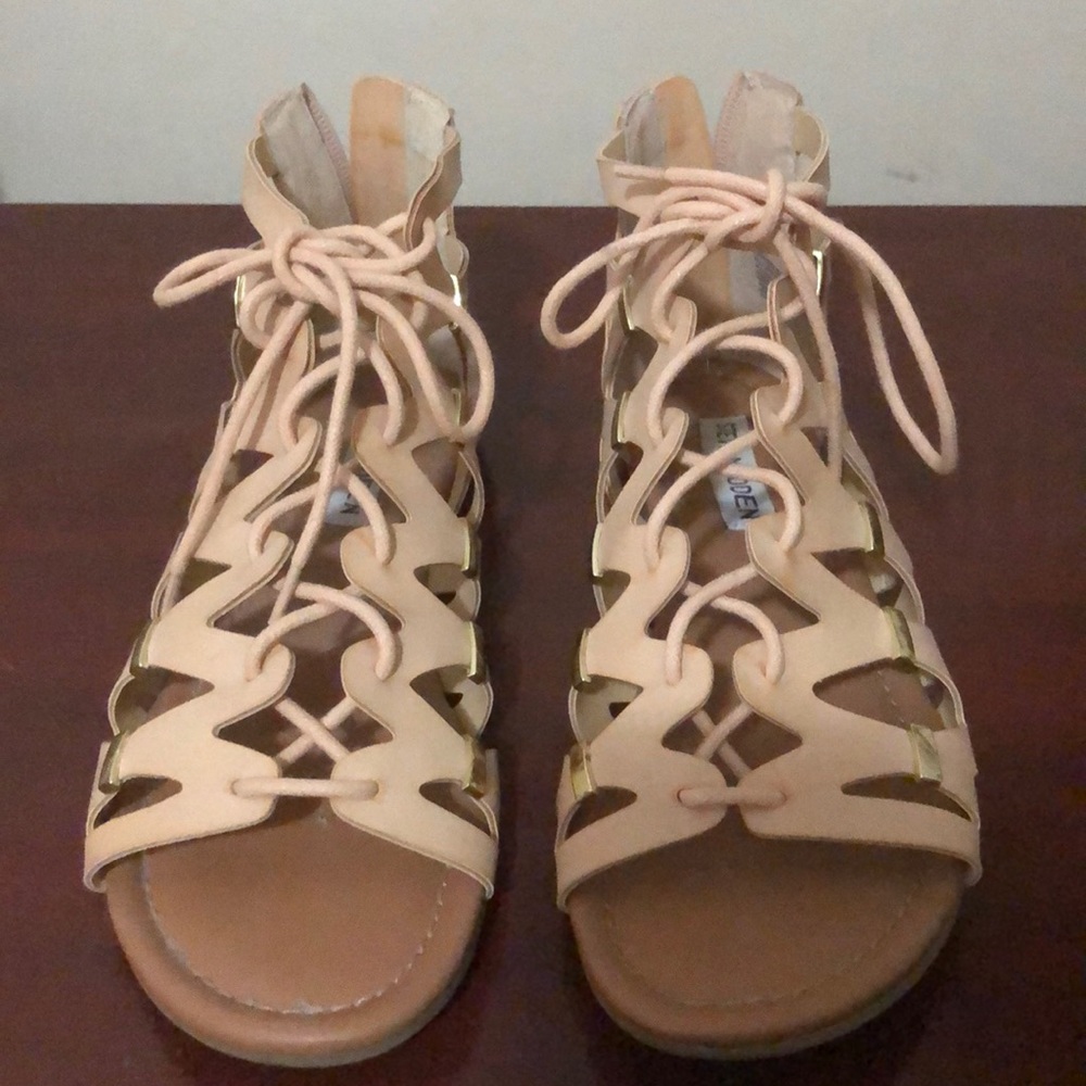 Lace up sandals.